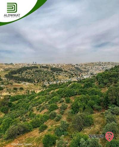 ارض للبيع في عمان - زبود وسيل حسبان مساحة الارض 6500 م على الشارع الرئيسي / شارع البحر الميت موقع اطلالة