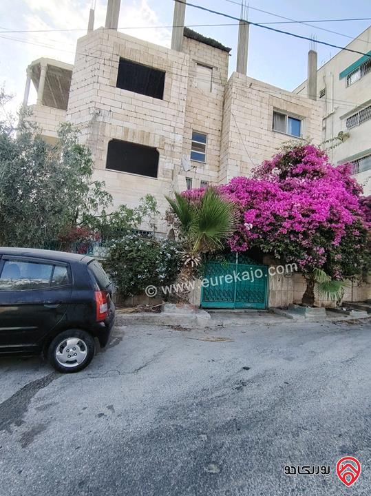 عمارة 3 طوابق على أرض 500م للبيع في الزرقاء - جبل طارق
