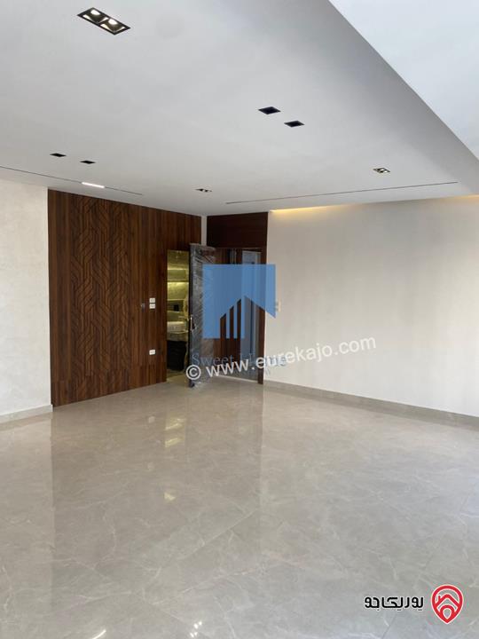 شقة أرضية فاخرة للبيع في عمان - أم أذينة قرب أبراج السادس 190م مع ترسات 130م لم تسكن