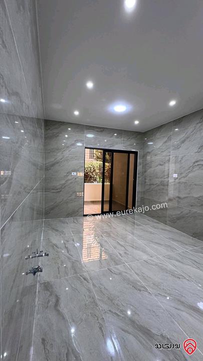 شقة طابق أرضي معلق مساحة 110م للبيع في عمان - الجاردنز