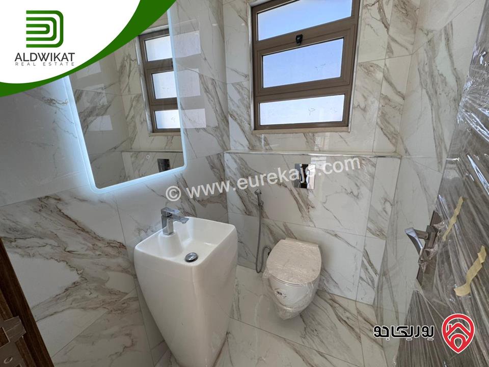 شقة طابقية مع روف للبيع في عمان - تلاع العلي مساحة البناء 260م ومساحة الترس 70م على شارعين