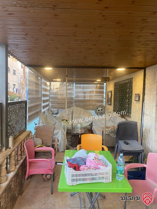 شقة ارضية مساحة 145م داخلي و 50م خارجي للبيع في عمان - ماركا الجنوبية نادي السباق