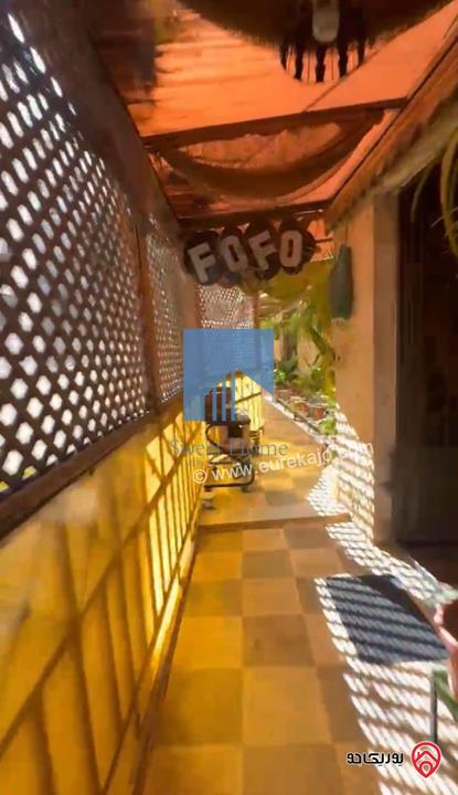 شقة شبه ارضية مساحة 205م مع حديقة وترسات 220م للبيع في عمان - تلاع العلي