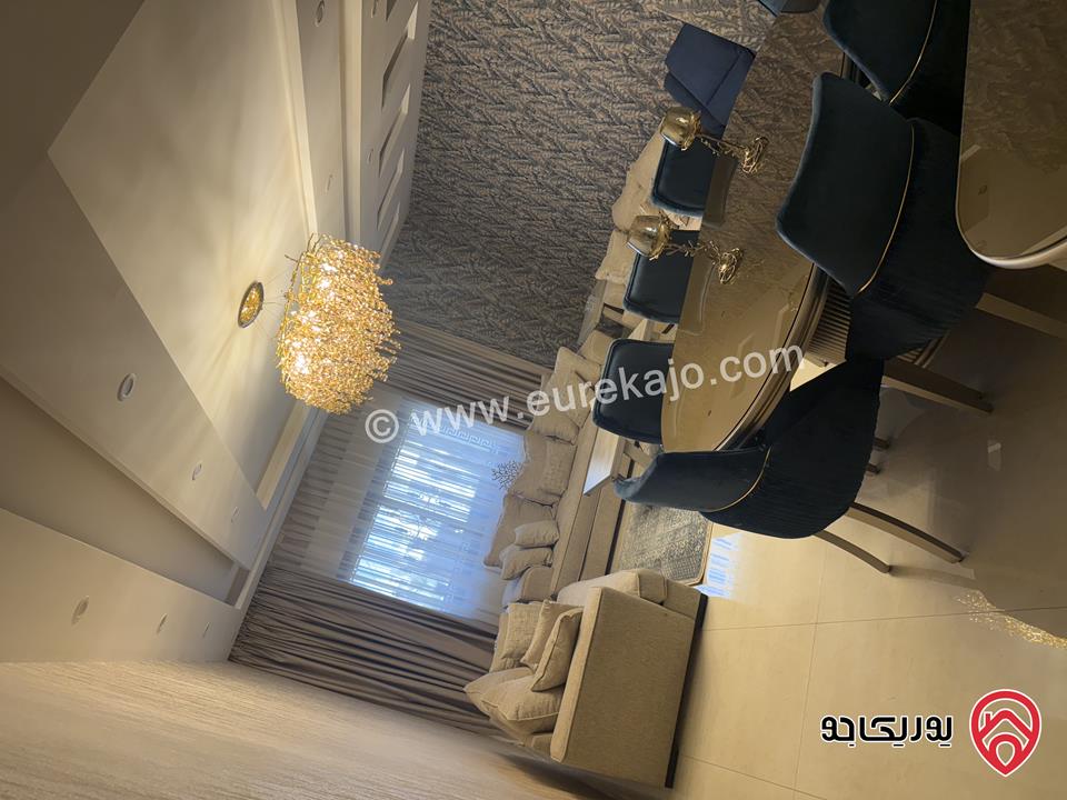 شقة ديلوكس أرضية مساحة 210م داخلي و 120م خارجي للبيع مفروشة في عمان - تلاع العلي