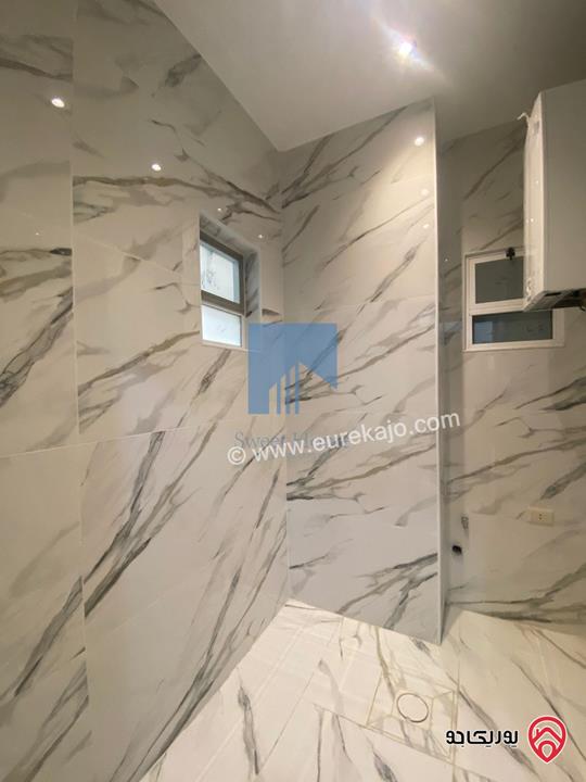 شقة فاخرة شبه أرضية مساحة 160م مع ترس 25م تشطيب سوبر ديلوكس للبيع في عمان - تلاع العلي