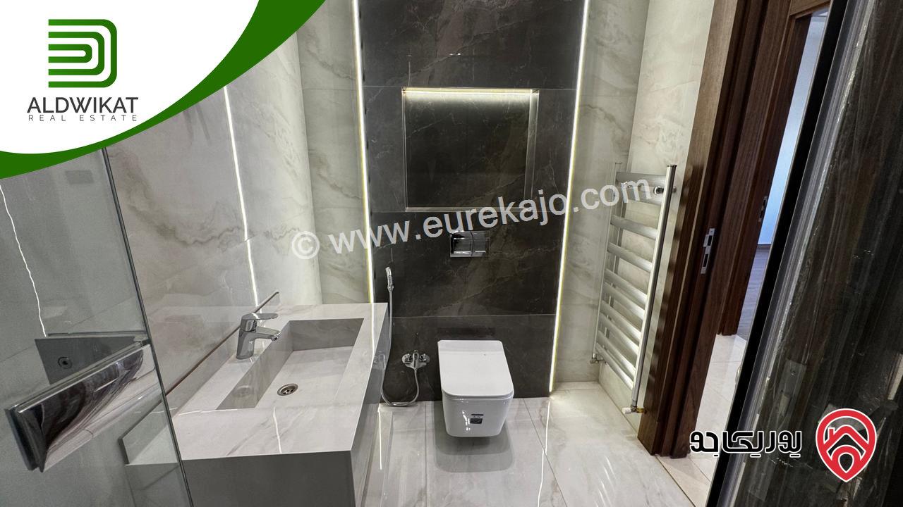 شقة ارضية للبيع في عمان - خلدا مساحة البناء 250 م والترس 80م موقع مميز واطلالة