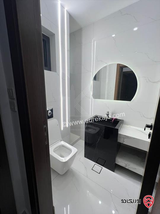 شقة فاخرة حديثة البناء مساحة 146م أرضية للبيع في عمان - البنيات