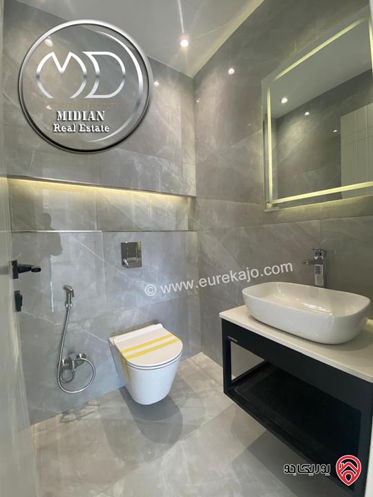 شقة دوبلكس جديدة طابق اخير مع روف للبيع في عمان - الجندويل مساحة 230م مع تراسات تشطيبات ديكورات عصرية اطلالة جميلة