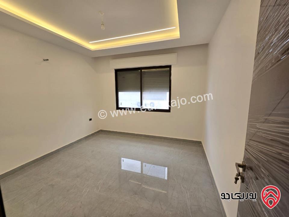 شقة جديدة مساحة 190 متر طابق اول للبيع في عمان - دير غبار قرب شارع الـ60