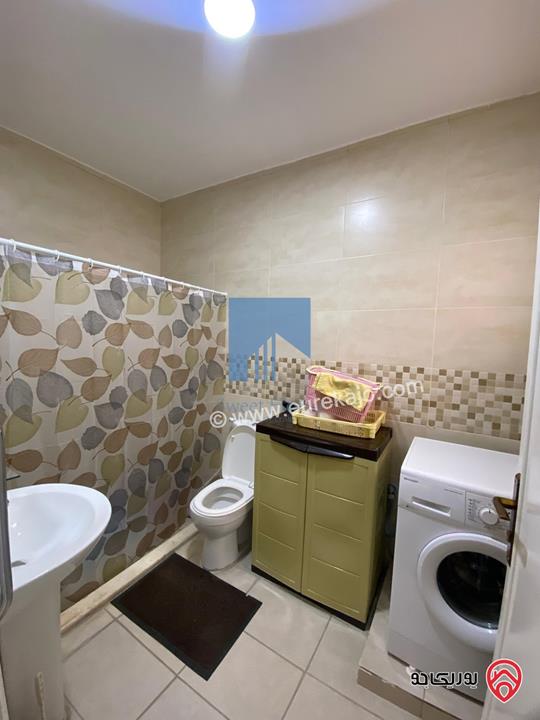 شقة مميزة شبه أرضية مساحة 100م مع حديقة وترسات 200م للبيع في عمان - أم السماق الشمالي