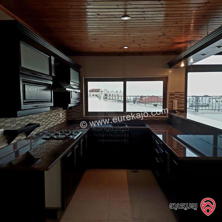 شقة فاخرة طابق اخير مع روف بمساحة داخلية 183م ومساحة الروف 140م للبيع في عمان - خلدا