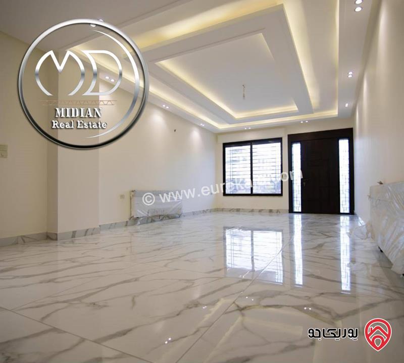 شقة أرضية جديدة للبيع في عمان - خلدا العوجانية مساحة 235م مع ترس 85م تشطيبات و ديكورات سوبر ديلوكس بسعر مميز