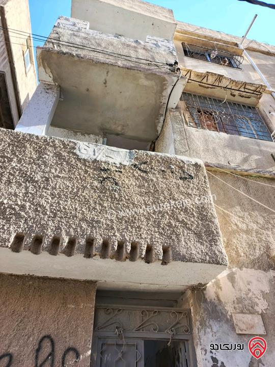 عمارة سكنية على أرض 250م للبيع في الزرقاء - الغويرية 