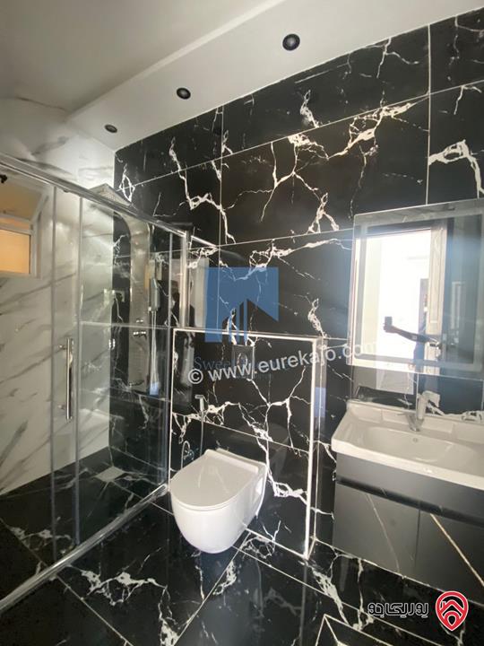 شقة أرضية فاخرة مساحة 200م مع ترس 10م لم تسكن للبيع في عمان - تلاع العلي