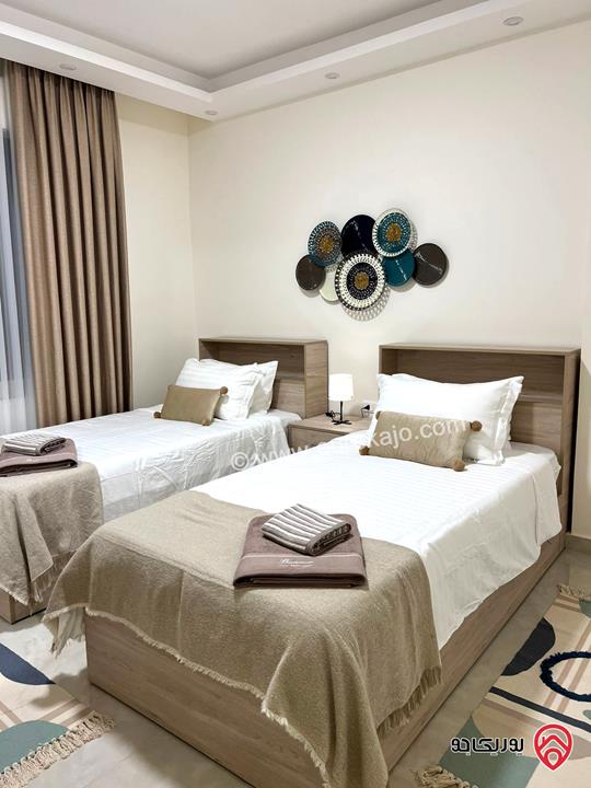 شقة فخمة مفروشة مساحة 100م مع حديقة 120م ومدخل خاص للإيجار في عمان - عبدون