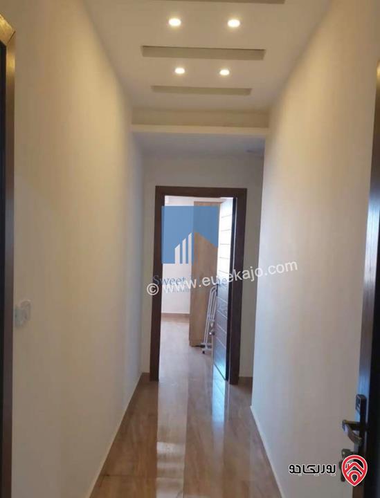 شقة أرضية فاخرة للبيع في عمان - دير غبار خلف زيت وزعتر 180م مع ترسات 100م تشطيب سوبر ديلوكس