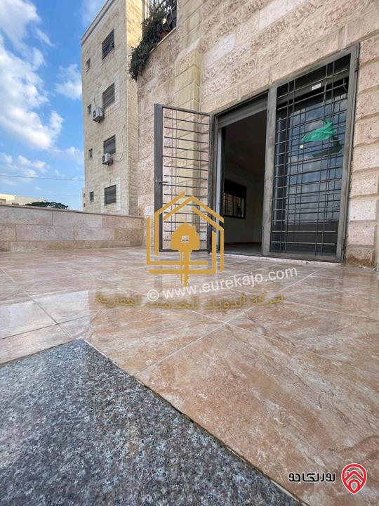 شقة فارغة أرضية مساحة 130م داخلي و 80م خارجي للايجار في عمان - الجبيهة 