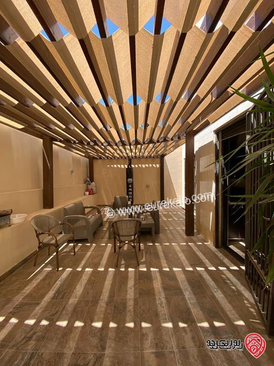 شقة طابق شبه ارضي مساحة 200م داخلي و 70م خارجي للبيع مفروشة في عمان - عبدون