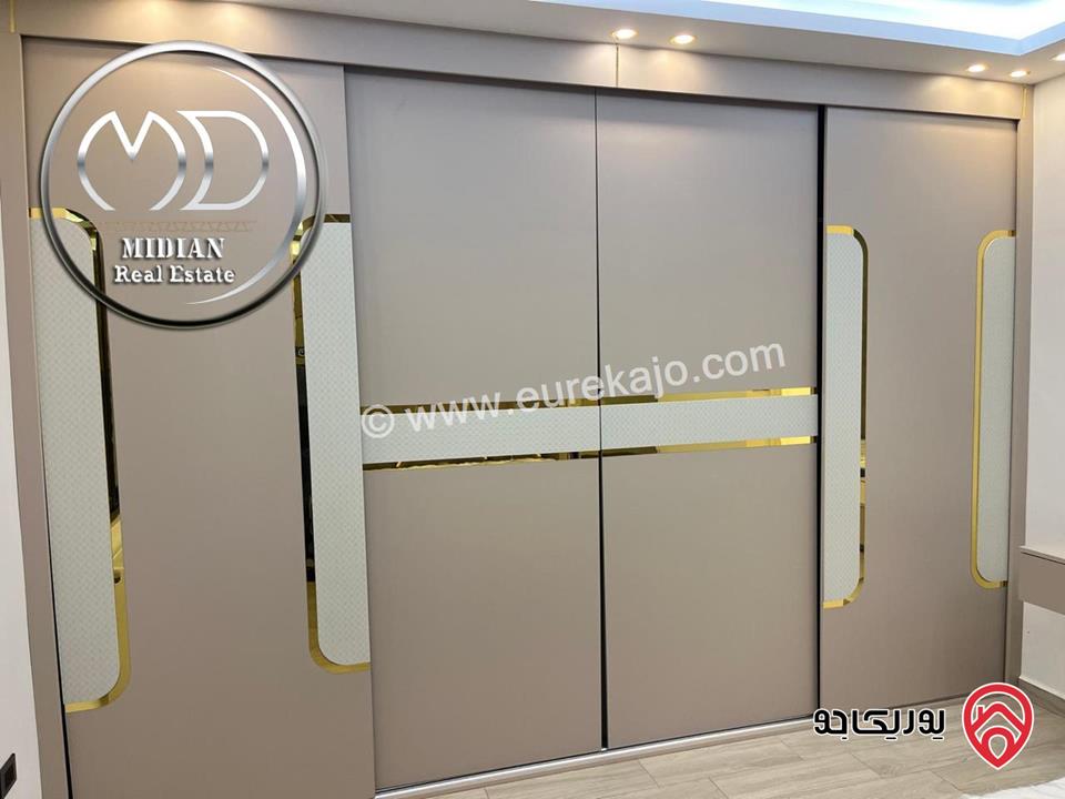 شقة أرضية مفروشة للايجار في عمان - طريق المطار مساحة 180م مع ترس 70م تشطيبات ديكورات فندقية فرش فاخر بسعر مميز