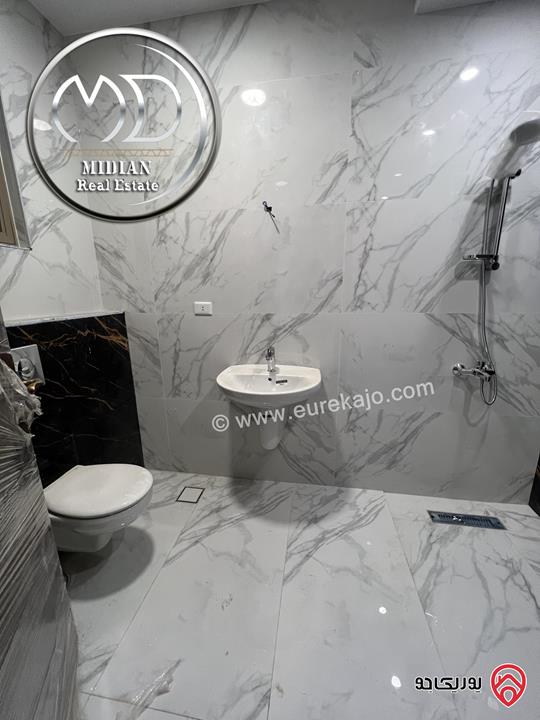 شقة أرضية جديدة للبيع في عمان - الدوار السابع مساحة 260م مع ترس و حديقة 200م تشطيبات سوبر ديلوكس بسعر مميز