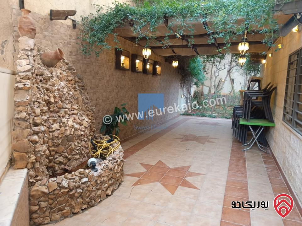 شقة أرضية مميزة مساحة 215م مع حديقة وترسات 120م للبيع في عمان - خلدا