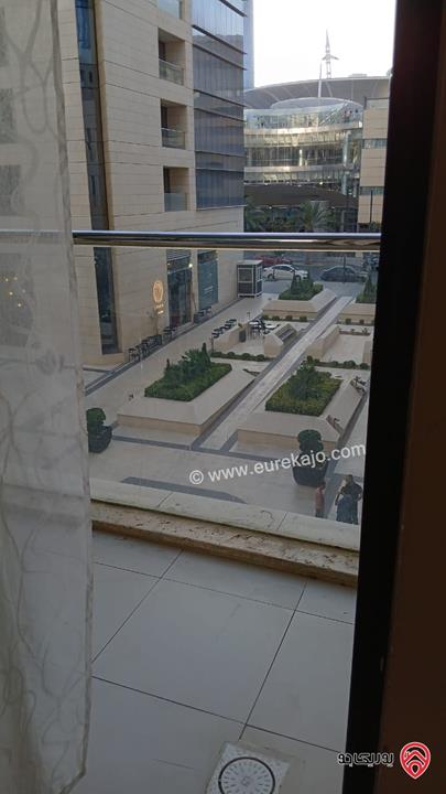 شقة مساحة 60م طابق اول للبيع مفروشة في عمان - ابراج داماك مطله على العبدلي مول