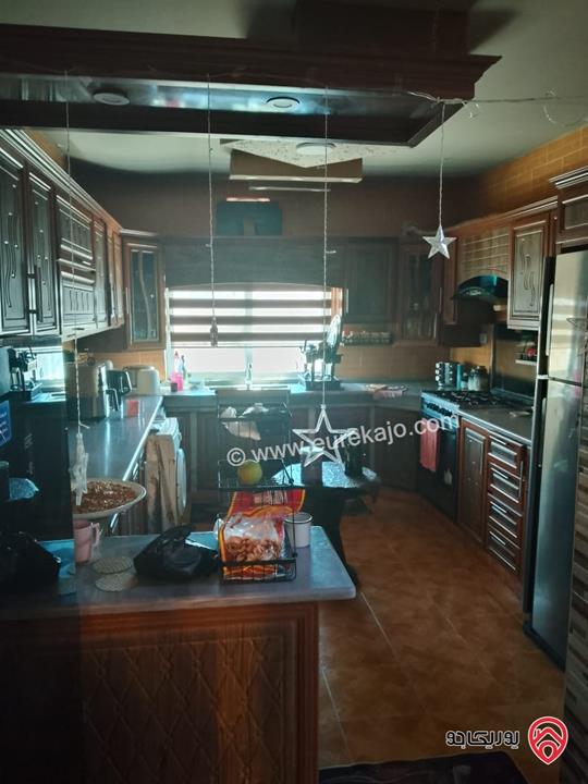 شقة طابق أول مساحة 133م للبيع في اربد - الحصن