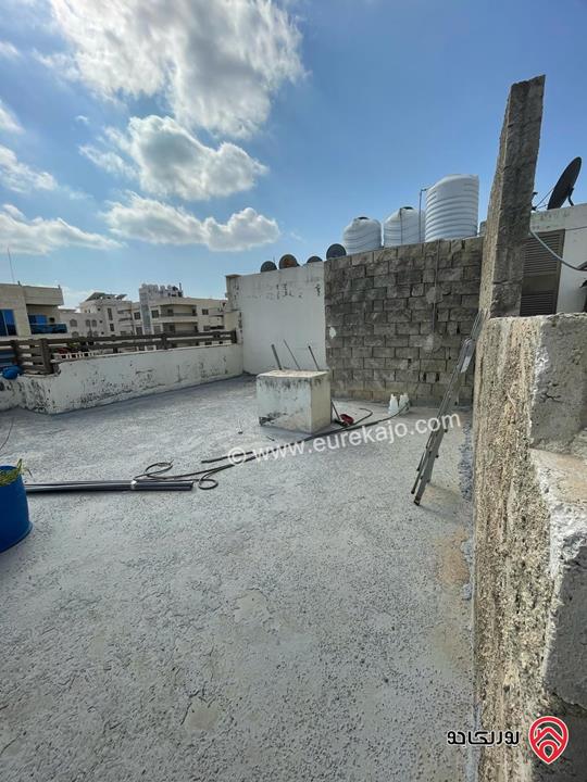 شقة ديلوكس طابق ثالث مساحة 203م + روف 77م غير مسجل للبيع في عمان - مرج الحمام