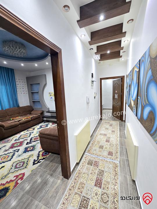 شقة ارضية مساحة 131م مع تراس 50م ومدخل خاص للبيع في عمان - الرابية 