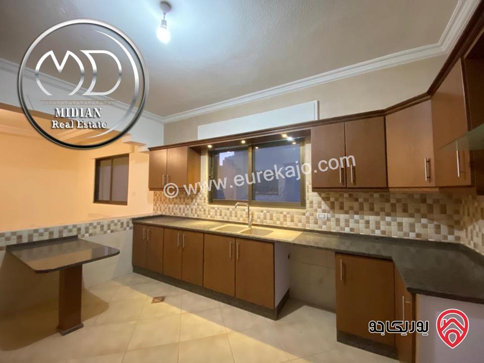 شقة شبه أرضي فارغة للايجار الرابية مساحة 170م مع ترس تشطيبات سوبر ديلوكس بسعر مميز