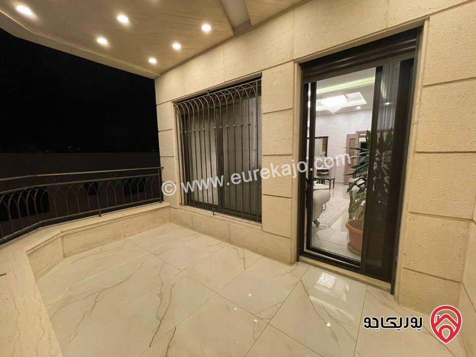 شقة طابق أخير مع روف مساحة 345م + ترس 60م للبيع في عمان - طريق المطار النخيل