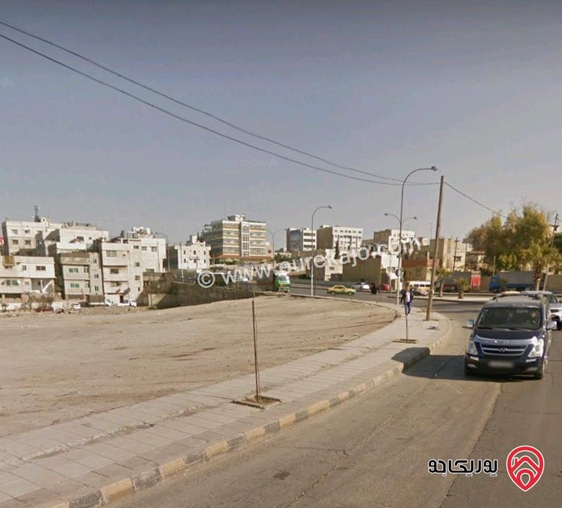 ارض تجارية مميزة مساحة 2 دونم و 319م تقع على ثلاث شوارع للبيع في عمان - الوحدات بالقرب من دوار الشرق الاوسط 