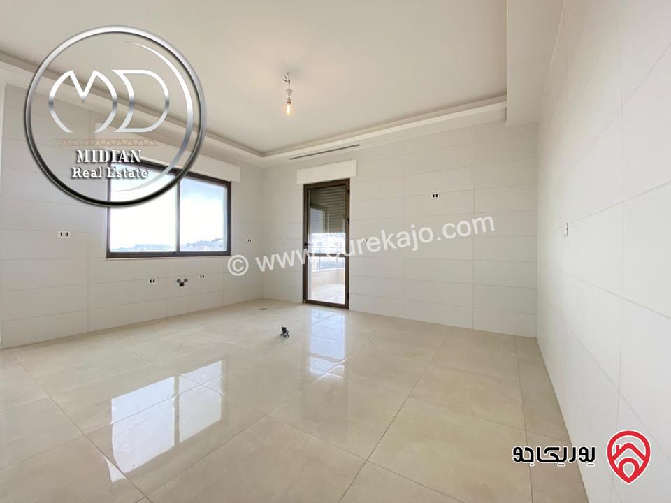 شقة جديدة للبيع في عمان - خلدا العوجانية طابق ثالث مع روف مساحة 225م تشطيبات و ديكورات سوبر ديلوكس اطلالة رائعة