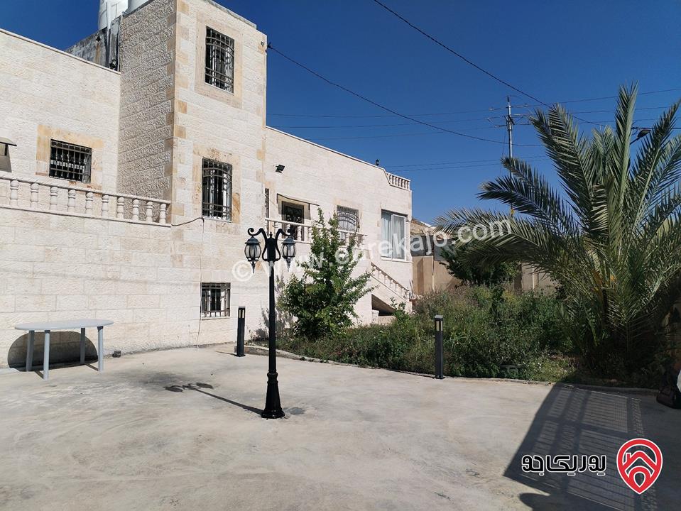 منزلين للبيع بجانب بعض على قطعة ارض واحدة مساحة 1 دونم و 361م في اربد