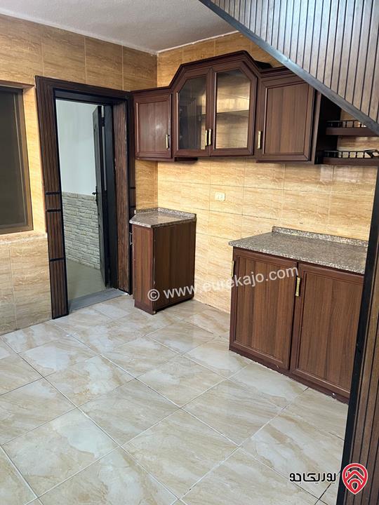 شقة أرضية مساحة 115م داخلي و 85م خارجي للببع في عمان - ضاحية الأمير حسن