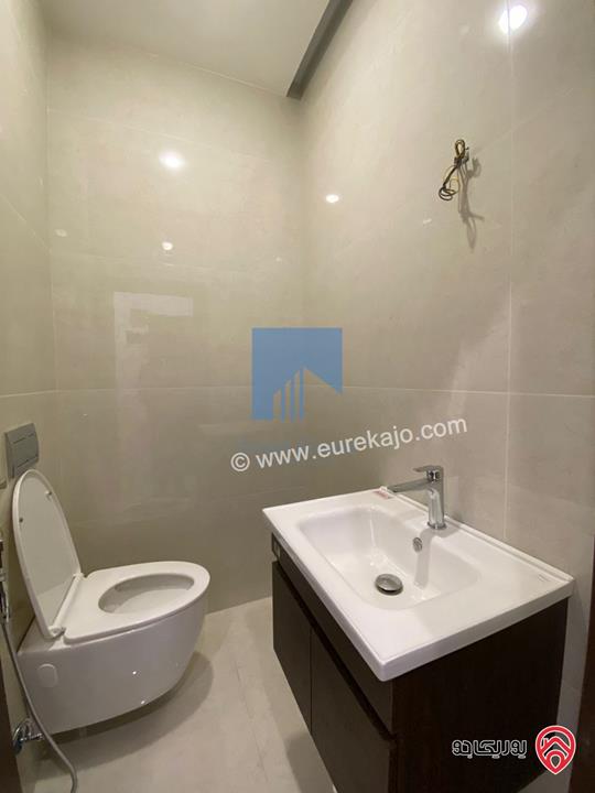 شقة أرضية فاخرة للبيع في عمان - الجندويل قرب المتصرفية 170م مع ترس 50م لم تسكن بسعر مغري