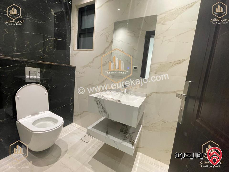 شقة ارضية مساحة 145م مع ترس خارجي 135م للايجار في عمان - الجندويل