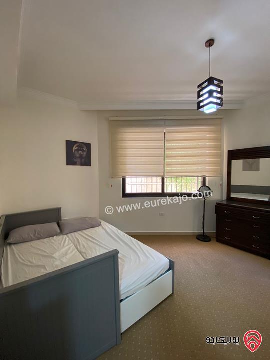 شقة طابق شبه ارضي مساحة 200م داخلي و 70م خارجي للبيع مفروشة في عمان - عبدون