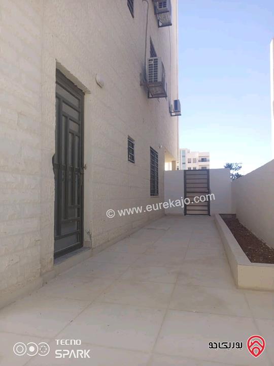 شقة مساحة 100م شبه ارضي للبيع في الزرقاء - مدينة الشرق