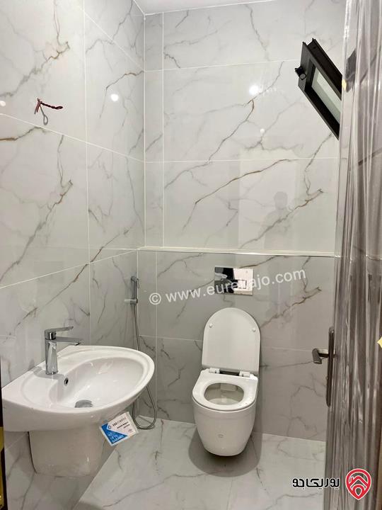 شقة مميزة طابق ارضي مساحة 145م للبيع في عمان - ابو علندا 