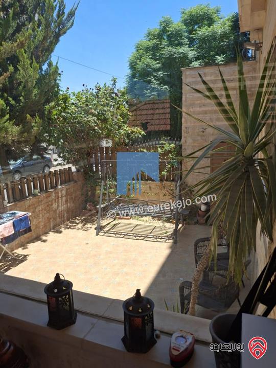 شقة أرضية فاخرة للبيع في عمان - ضاحية النخيل 186م مع ترس 70م بسعر مغري