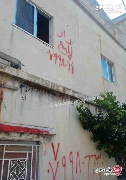 قطعة ارض 232م عليها طابقين بناء قديم كل طابق 100م للبيع في عمان - المدينة الرياضية