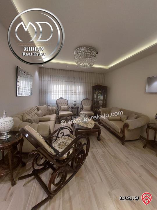 شقة ارضية للبيع في عمان - حي الصحابة مساحة 205م مع ترس و حديقة 70م تشطيبات ديكورات سوبر ديلوكس بسعر مميز