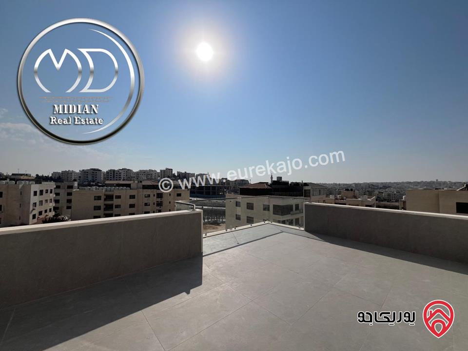 شقة دوبلكس جديدة طابق أخبر مع روف للبيع في عمان - حي الصحابة مساحة 215م مع تراسات اطلالة رائعة بسعر مميز