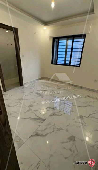 شقة شبه ارضية 90م مع ترس 120م ومدخل خاص فارغة للايجار في عمان - الجندويل