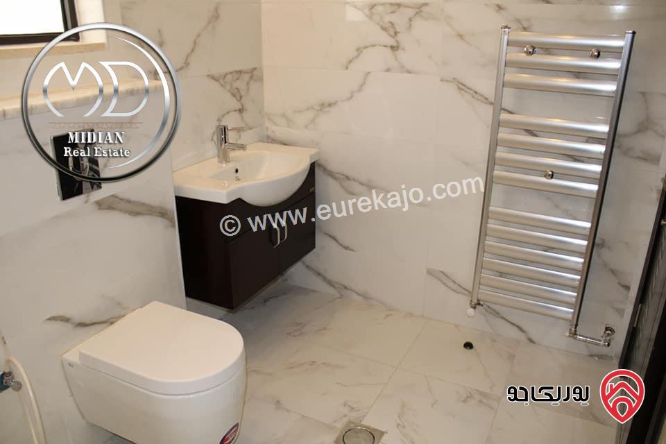 شقة ارضية جديدة للبيع في عمان - ضاحية النخيل مساحة 250م مع ترس و حديقة 150م تشطيبات و ديكورات سوبر ديلوكس