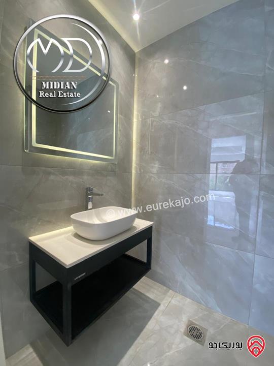 شقة دوبلكس جديدة طابق اخير مع روف للبيع في عمان - الجندويل مساحة 230م مع تراسات تشطيبات ديكورات عصرية اطلالة جميلة