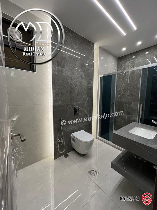 شقة شبه ارضي جديدة للبيع في عمان - ضاحية الرشيد مساحة 225م مع ترس 100م تشطيبات سوبر ديلوكس بسعر مميز 