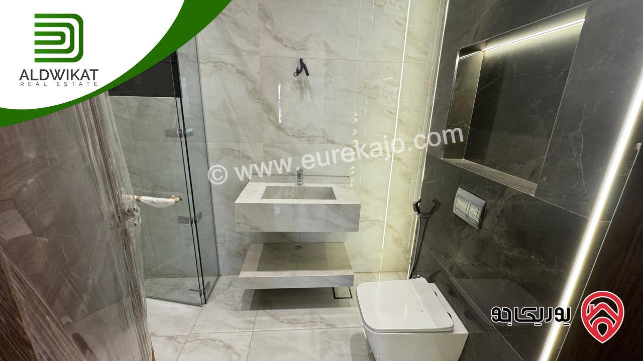 شقة ارضية للبيع في عمان - خلدا مساحة البناء 250 م والترس 80م موقع مميز واطلالة