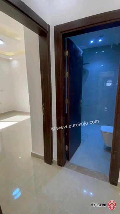 شقة جديدة طابق اول مساحة 140متر للإيجار في عمان - مرج الحمام 